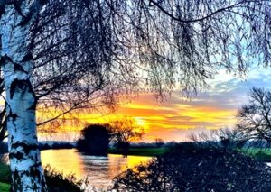 landscape image of winter sunrise over River Trent, near Swarkestone Bridge
