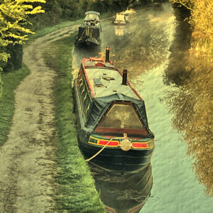 Textured effect portrait image of canal boats on the Trent and Mersey Canal near Swarkestone Lock, Derbyshire